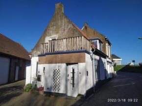 The cosy little house with the sundial